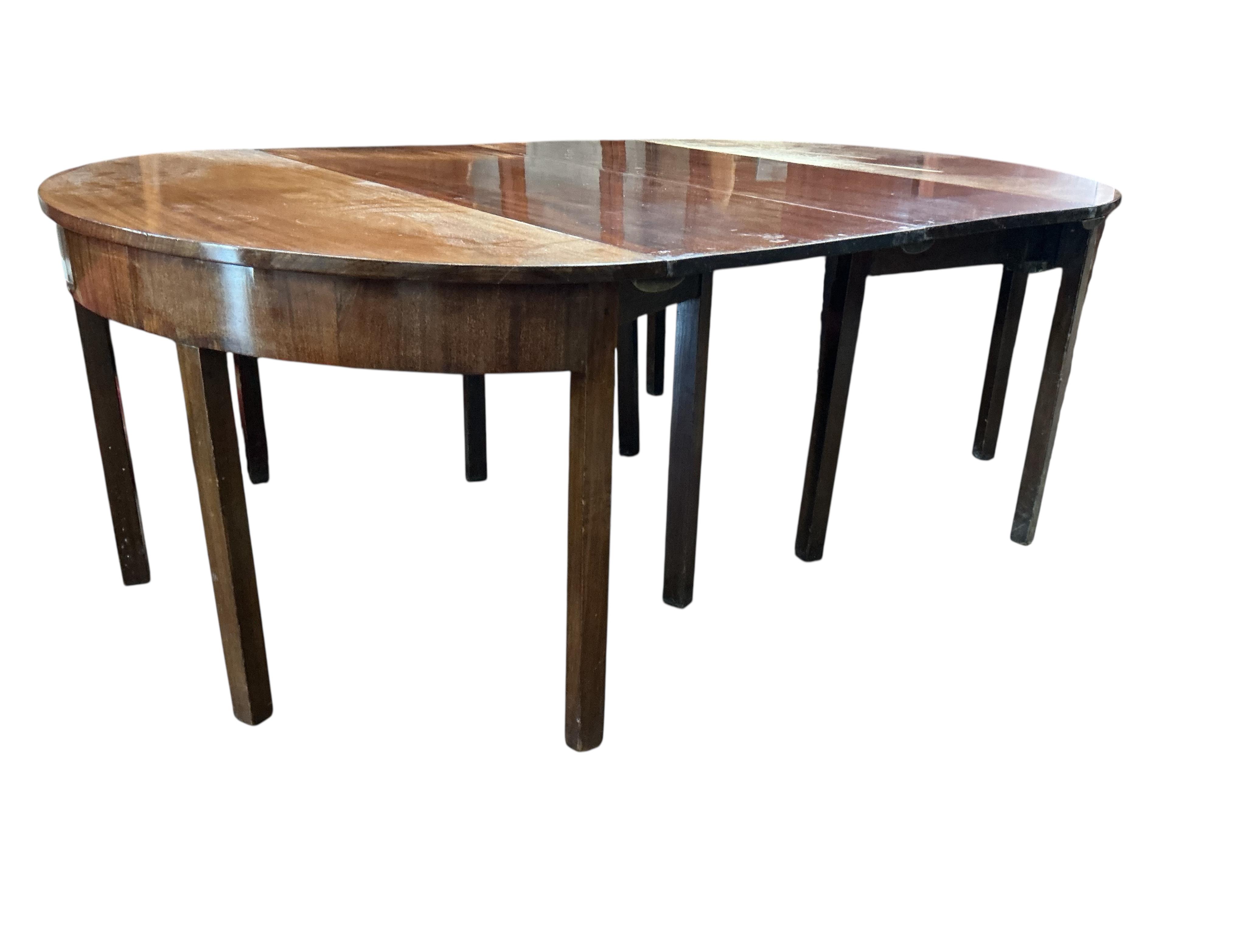 A George III mahogany D end extending dining table, 208cm extended, two spare leaves, depth 131cm, height 72cm